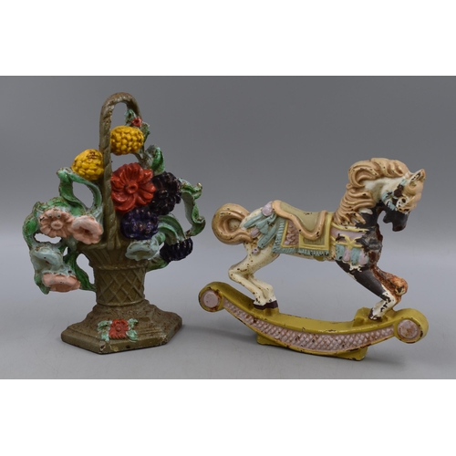 181 - Two Vintage Cast Iron Door Stops, Includes Flower Bouquet and Carousel Horse. Tallest Approx 24cm Ta... 