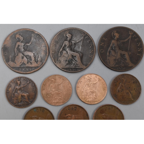 98 - A Selection of Three Victorian Pennies and Twelve George V, George VI and Elizabeth II Farthings.