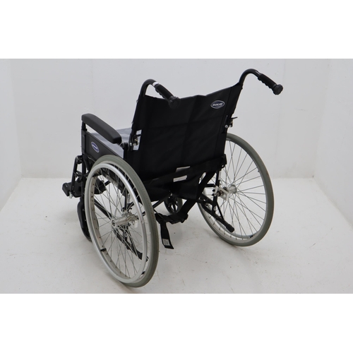 539 - Invacare Wheel Chair With Foot rests and Cushion