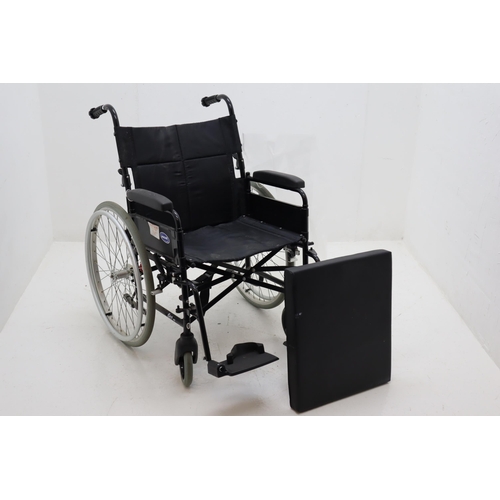 539 - Invacare Wheel Chair With Foot rests and Cushion