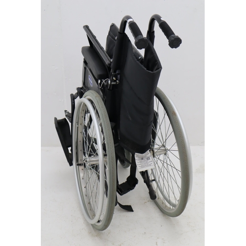 539 - Invacare Wheel Chair With Foot rests and Cushion