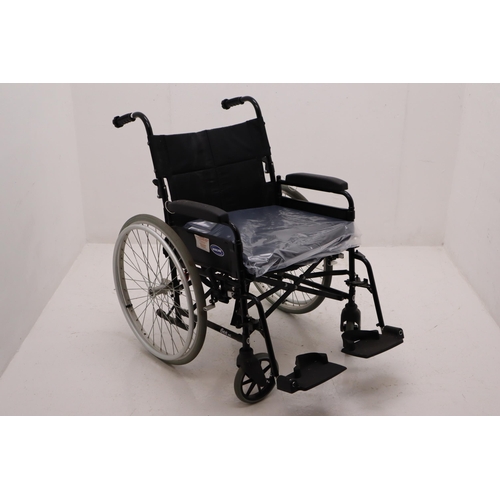 539 - Invacare Wheel Chair With Foot rests and Cushion