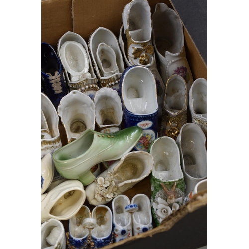 593 - A Large Selection of Assorted Ceramic Shoes.