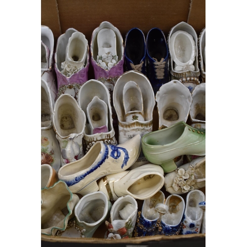 593 - A Large Selection of Assorted Ceramic Shoes.