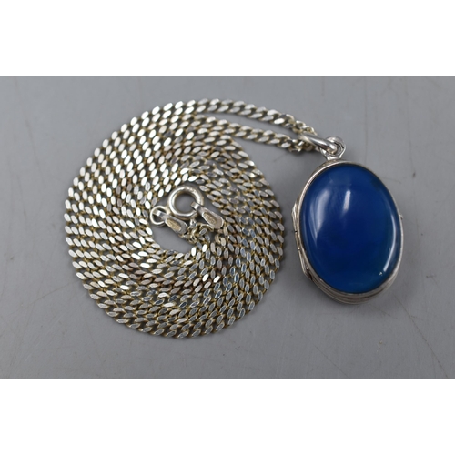 10 - A Blue Stoned 925. Silver Locket Pendant on 925. Silver Chain.