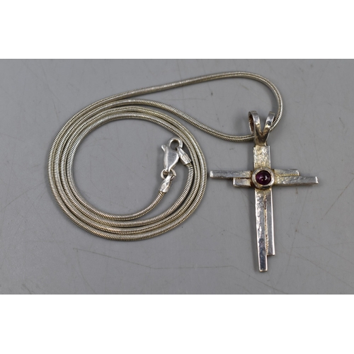 1 - A 925. Silver Necklace With Garnet Stoned Cross Pendant.