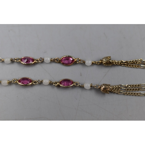 10 - A Silver Pink and Opaque Stoned Necklace.