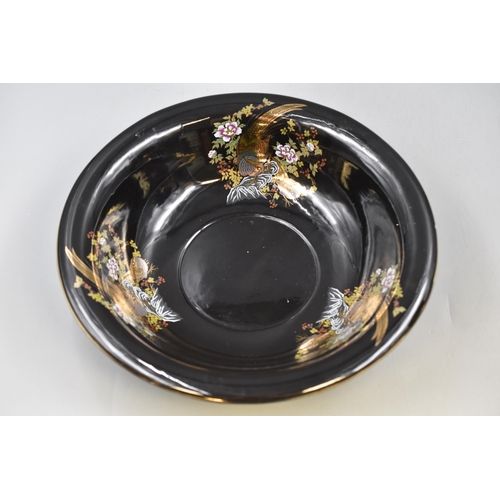 230 - A Black Gilt Ceramic Jug and Bowl, Depicting Birds. AF