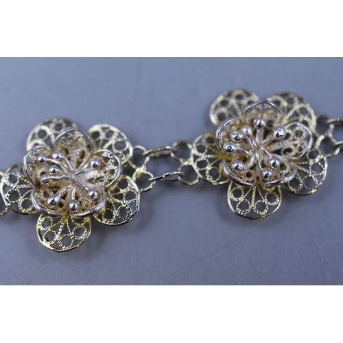 31 - A 925. Silver Filagree Floral Bracelet.