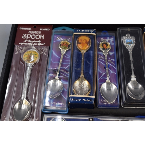 35 - A Selection of Eleven Collector's Teaspoons.