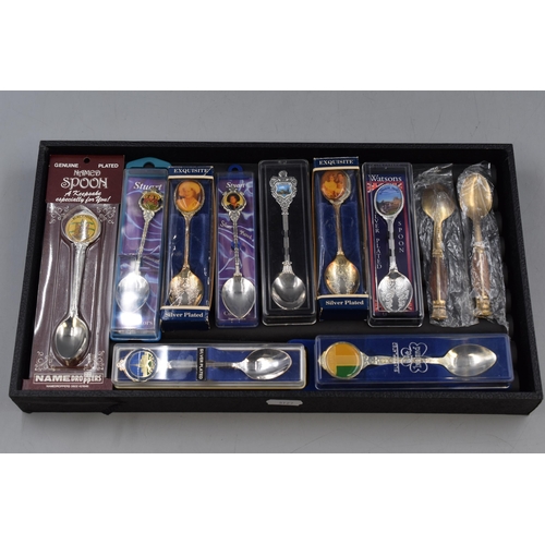 35 - A Selection of Eleven Collector's Teaspoons.