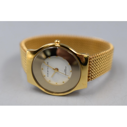 49 - A Christin Lars Gold Tone Water Resistant Watch, In Presentation Box.