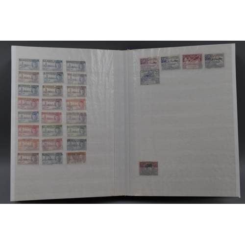 312 - Stock Album Containing a selection of Commonwealth Stamps of George VI