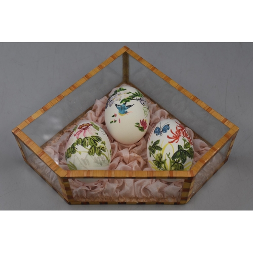 194 - Selection of 7 Cases containing Hand painted eggs in Various Designs