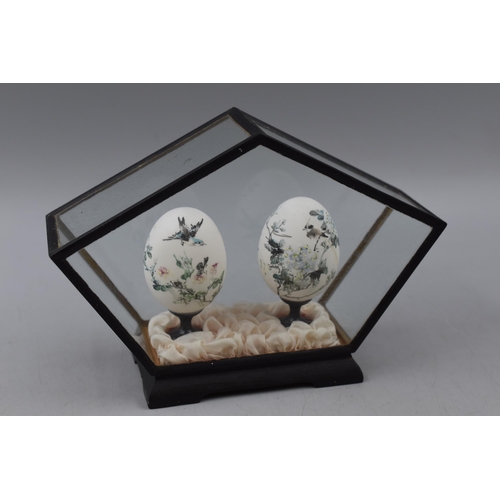 194 - Selection of 7 Cases containing Hand painted eggs in Various Designs