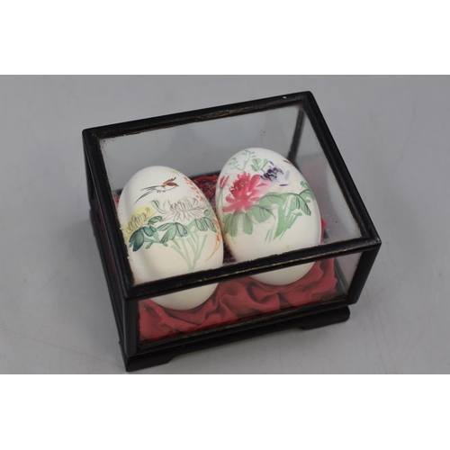 194 - Selection of 7 Cases containing Hand painted eggs in Various Designs