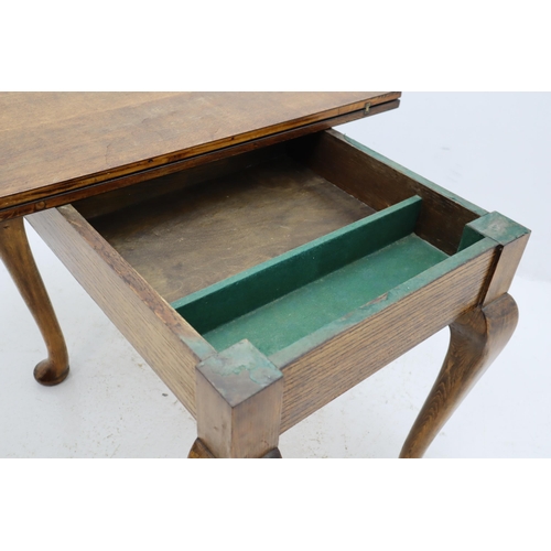 463 - An Oak Fold-Over Dining Table, With Felt Lined Interior Storage. Approx 47.5