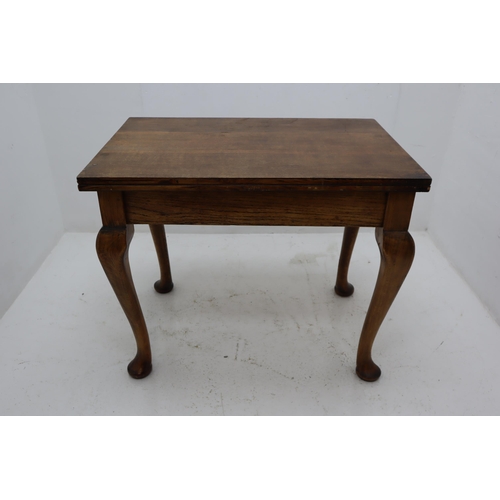 463 - An Oak Fold-Over Dining Table, With Felt Lined Interior Storage. Approx 47.5