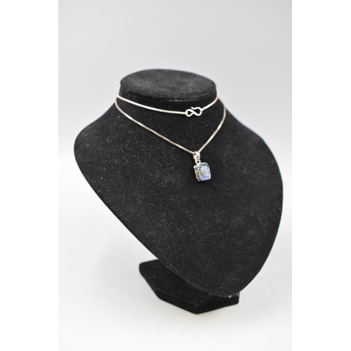 9 - A 925. Silver Blue Stoned Pendant on Silver Chain.