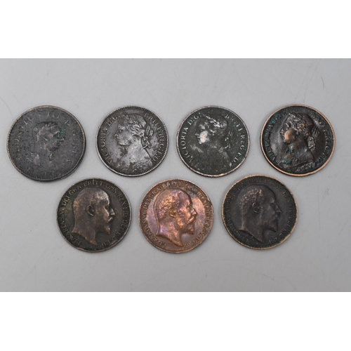 76 - Seven UK Farthing Coins, 1807-1909.