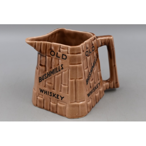 124 - A vintage Arklow Pottery Bushmills Whiskey 'Causeway' advertising water jug.