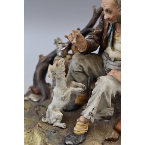 147 - Capodimonte Figure of old Man feeding Dog with Bone by Tyche Tosca of italy (7