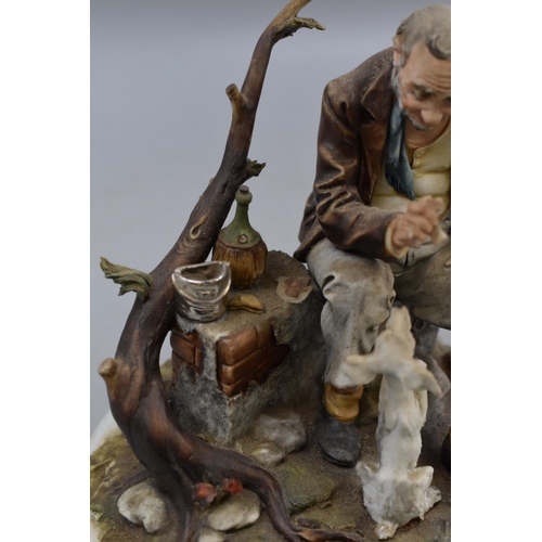 147 - Capodimonte Figure of old Man feeding Dog with Bone by Tyche Tosca of italy (7