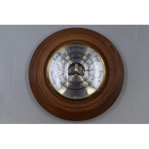 175 - Two Vintage Barometers, includes Circular Wooden Barometer and a Standing Weather Forcaster. Largest... 