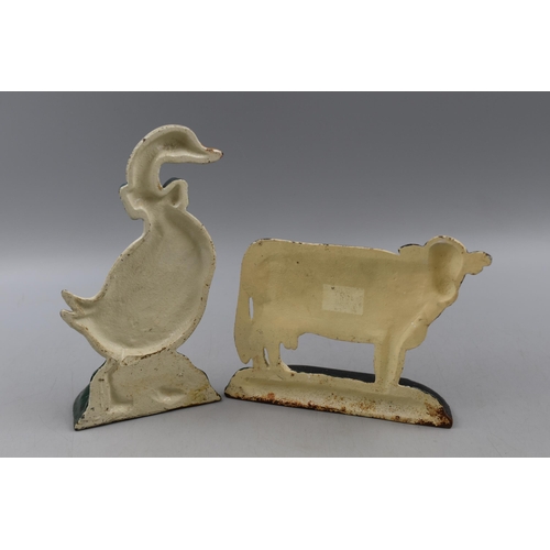 182 - Two Cast Iron Door Stops, a Cow and a Goose. Tallest is approx. 9”