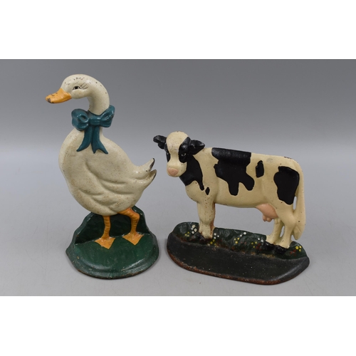 182 - Two Cast Iron Door Stops, a Cow and a Goose. Tallest is approx. 9”