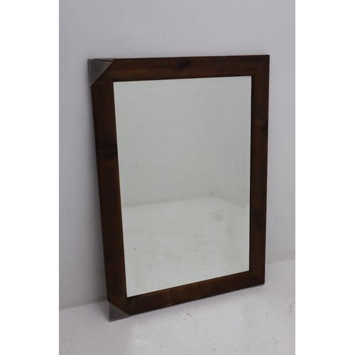 215 - Wood Framed Beveled Edged Mirror Approx. 90cm x 64cm