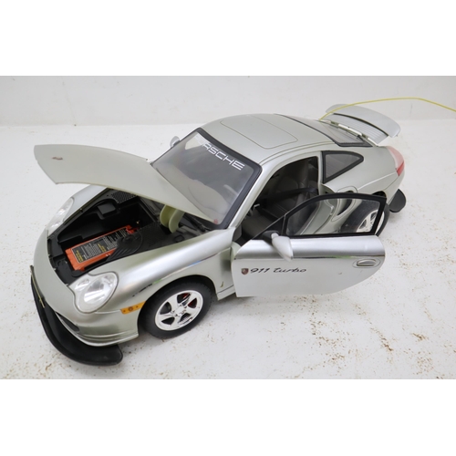 413 - Radio Controlled Porsche 911 Turbo, Hand Control Lights Up When Tested, In Need of Battery Charger a... 