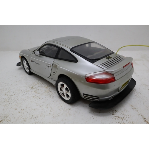 413 - Radio Controlled Porsche 911 Turbo, Hand Control Lights Up When Tested, In Need of Battery Charger a... 