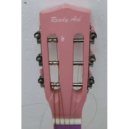 417 - Pink Ready Ace Three Quarter Size Six String Acoustic guitar with Guitar Bag (one string missing)