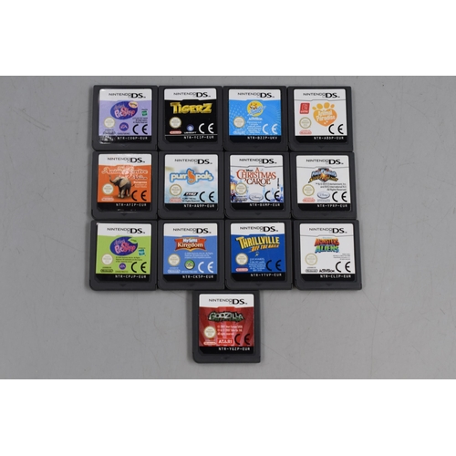 422 - A Nintendo DS In Red With A Selection of approx 45 DS Games In Four Cases and Mario Kart Bag. Includ... 