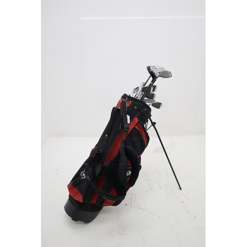 263 - A Dunlop Golf Bag With A Selection of Dunlop John Daly LCG Series Golf Clubs, Pair of Size 9 Golf Sh... 