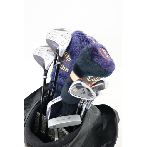 264 - A Dunlop Golf Bag With A Selection of Dunlop and Callaway Golf Clubs, Golf Balls, Tees and More.