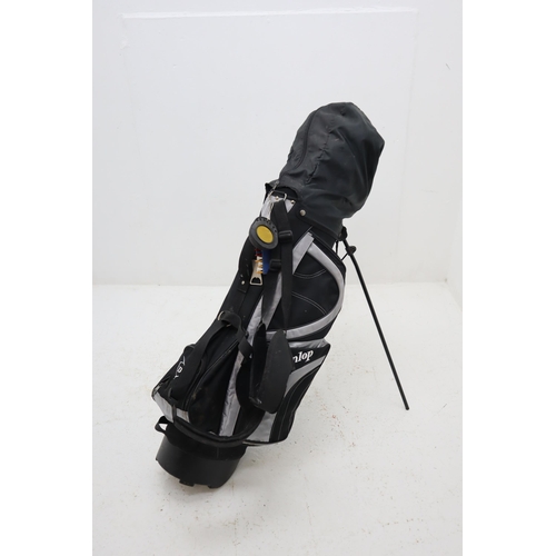 264 - A Dunlop Golf Bag With A Selection of Dunlop and Callaway Golf Clubs, Golf Balls, Tees and More.