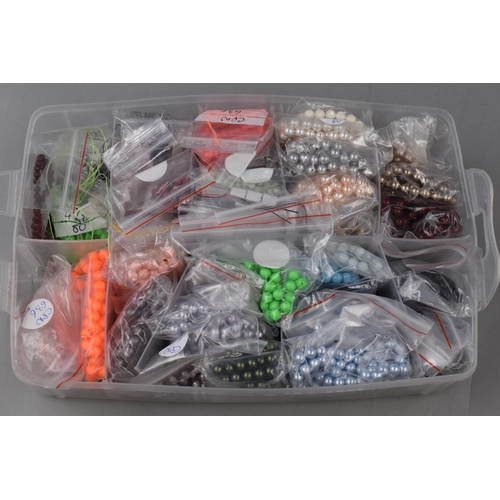 267 - LARGE Collection of Pre-Drilled Crafting Beads in a Three Tier Sectional Storage Case .