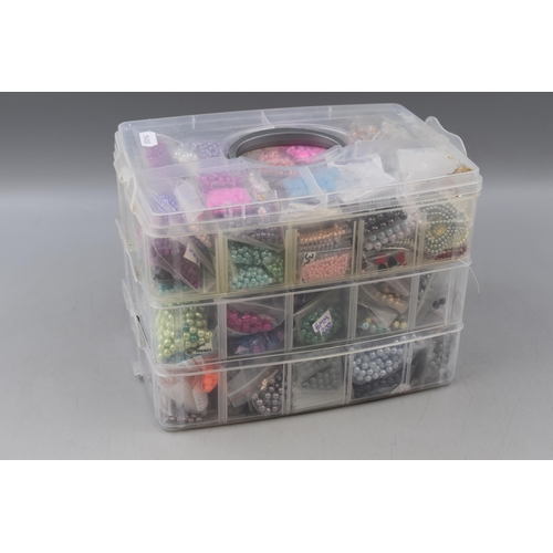 267 - LARGE Collection of Pre-Drilled Crafting Beads in a Three Tier Sectional Storage Case .