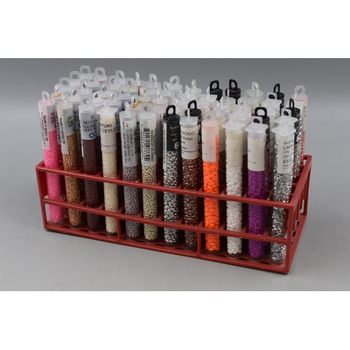 283 - Jewellery/Craft Makers Storage Stand with 60 Separate Storage Tubes Filled with Pre-Drilled Beads .