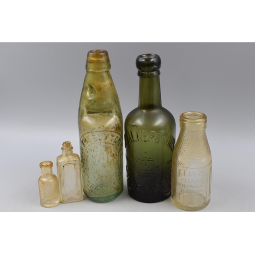 324 - A Large Selection of Collectable Glass Bottles. Includes Walker & Sons, Greenhall Whitley & ... 