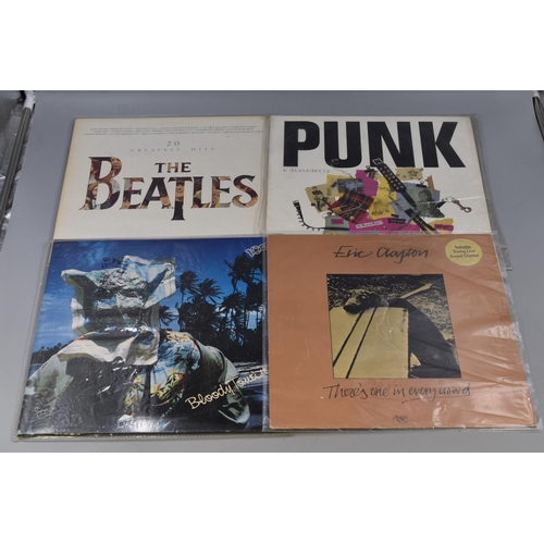 328 - A Selection of Vinyl LP's. Includes The Beatles, Eric Clapton, Dire Straits, 10CC, Roxy Music and Mo... 