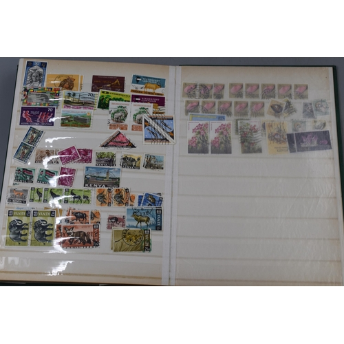 347 - Two Stock Albums containing a selection of GB, Commonwealth and Worldwide Stamps dating from George ... 