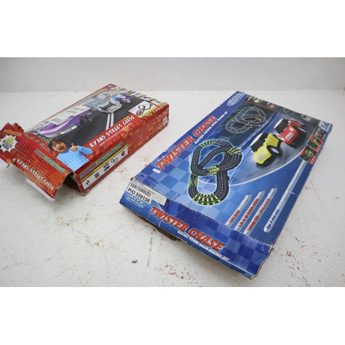 352 - Two Unchecked Electric Powered Road Racing Sets to include Scalextric and one other