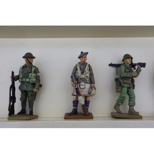 245 - A Set of 74 Del Prado Metal WWI And WWII Military Figures, With Wooden Six Tier Display Unit.