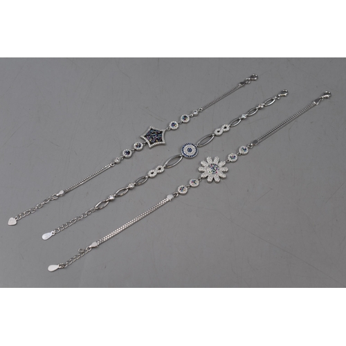 29 - Selection of Three Silver 925 Diamante and Coloured Stone Bracelets, includes Flower, Star and Figur... 