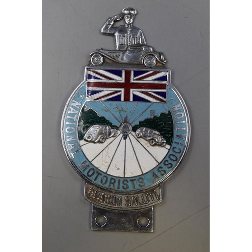 105 - National Motorists Association. A 1930s badge with four-colour enamels, nickel-plated on brass with ... 