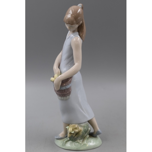 215 - A Lladro Girl With Tulips Ceramic Figure, Approx 9