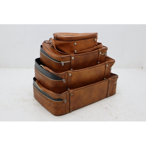 651 - Collection of Four Matching Vintage leatherette Suit cases